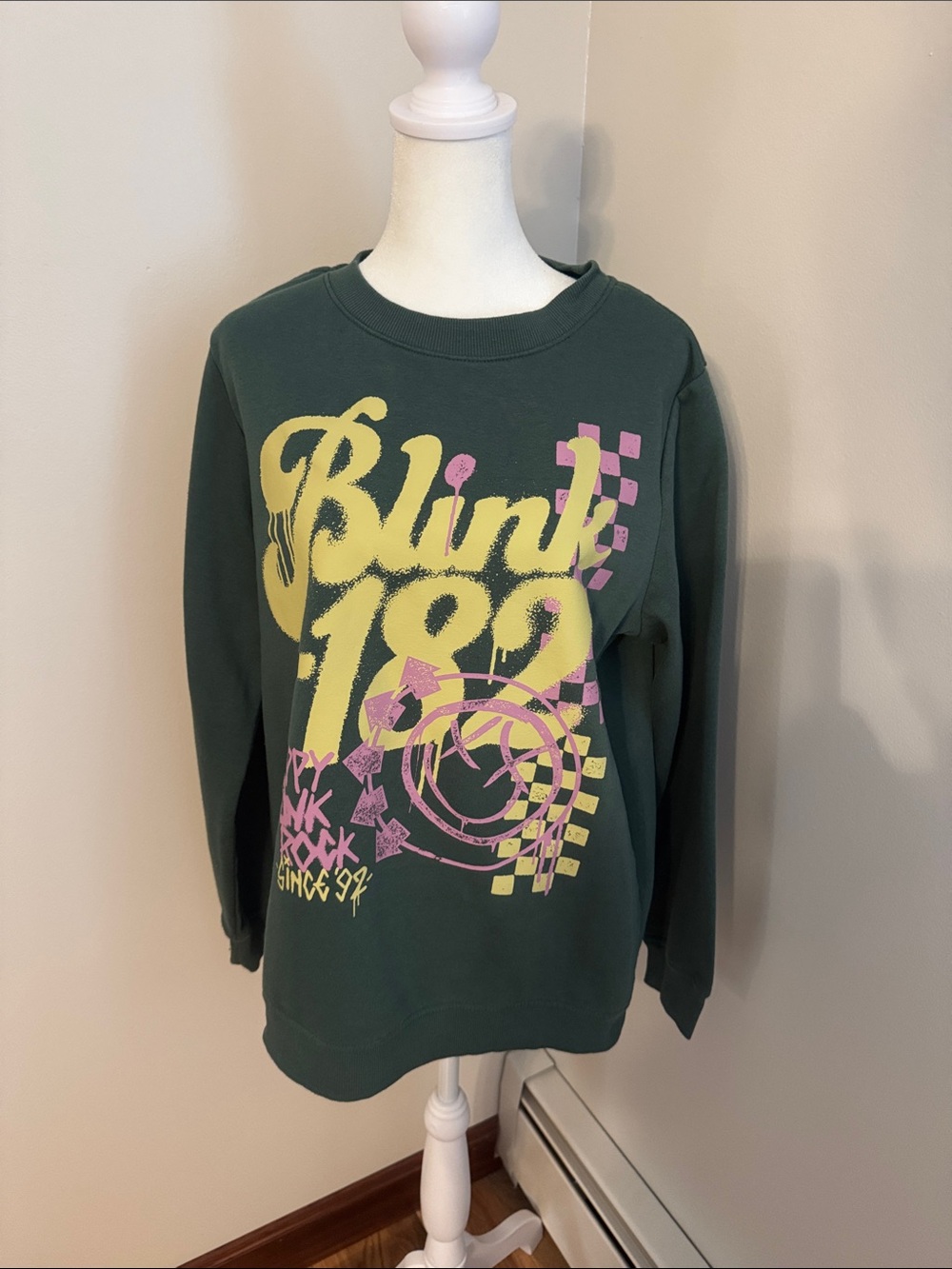 Blink-182 Graphic Crewneck Sweatshirt in Dark Green with Yellow & Pink Print